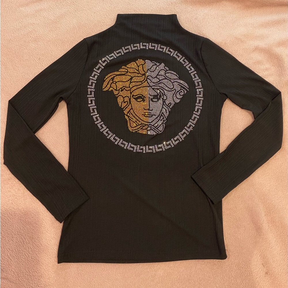 Versace black turtleneck. New with no tag, never worn. Not original Versace!